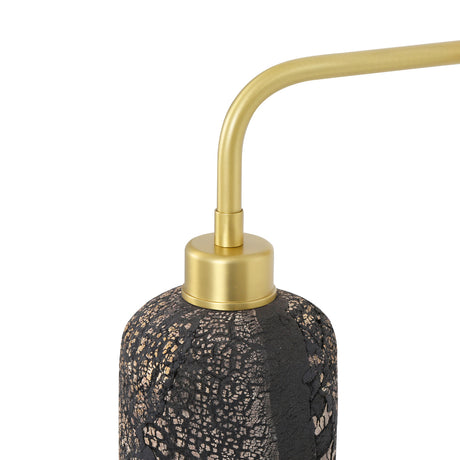 Osier Ceramic Wall Light in Black Clay, close-up of the cylindrical crackle-glazed shade with brass fitting and curved arm against a plain white background.