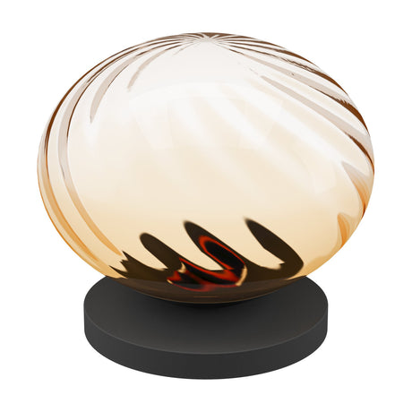 Pantoja LED table lamp with a flattened amber ribbed glass globe on a round black steel base, shown on a plain white background.