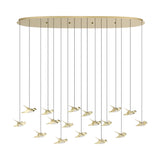 Paratebueno 2 linear pendant light with a long oval brass canopy and seventeen bird-shaped LED shades in brass finish hanging at varied heights, shown on a white background.