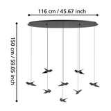 Paratebueno 8 Light Linear Pendant Light in black, oval ceiling plate with eight cords suspending bird-shaped shades in dark nickel-nero finish, shown with size dimensions on a white background.