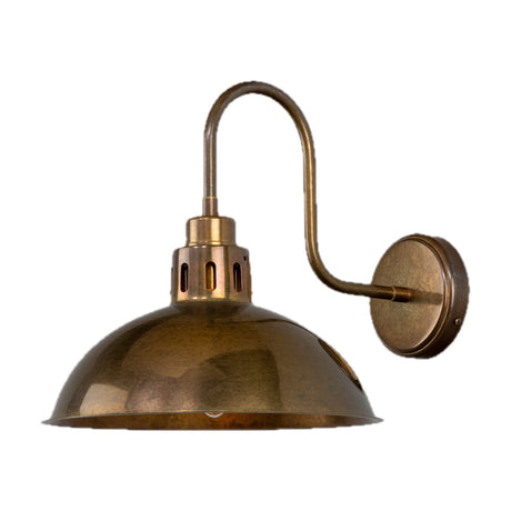 Paris Brass Swan Neck Wall Light with round backplate, curved arm, slotted gallery, and wide dome shade in brass finish, shown on a plain white background.