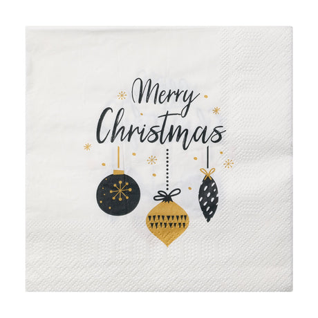 White paper napkin from the Pasig set, printed with "Merry Christmas" in black script above three hanging baubles in black, gold, and spotted black, with gold stars and a textured border.