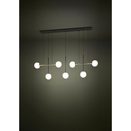 Paz linear pendant light with seven opal glass globes on black and brushed brass bars, suspended from a black ceiling canopy against a dark background.