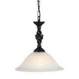 The Pembroke 1 Light Pendant - Black boasts a frosted glass shade complemented by a decorative metal stem featuring an intricate twisted design. Its hand-forged iron craftsmanship enhances its elegant appeal, and it's gracefully suspended by a metal chain.