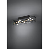 Penela LED ceiling light with a black rectangular open frame, zigzag white LED strips and gold bars inside, mounted on a ceiling against a grey background.