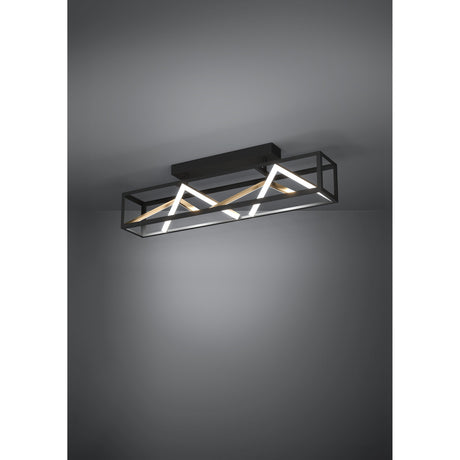 Penela LED ceiling light with a black rectangular open frame, zigzag white LED strips and gold bars inside, mounted on a ceiling against a grey background.