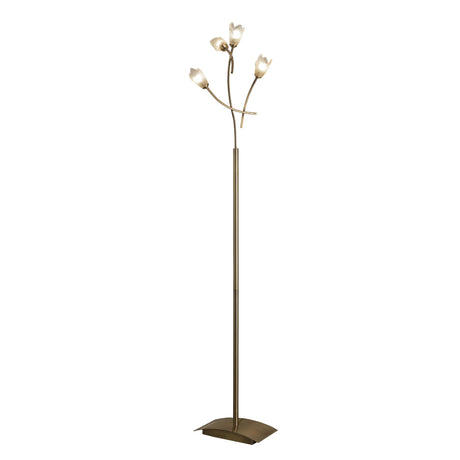 The Pietra 4 Light Floor Lamp in antique brass features a rectangular base and four upward-curving branches, each with a frosted glass flower-shaped shade that provides soft ambient lighting.
