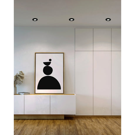 Pineda LED Downlight 8.4cm Set of 3 in black, round recessed fittings shown on a white ceiling above a hallway with a sideboard, framed print, and fitted wardrobes.