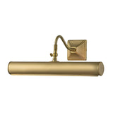 The Picture Light 2 Light Large in Brushed Brass features a cylindrical light mounted on a square backplate. It includes an adjustable arm for customizable lighting, providing a sleek and modern design ideal for showcasing artwork.