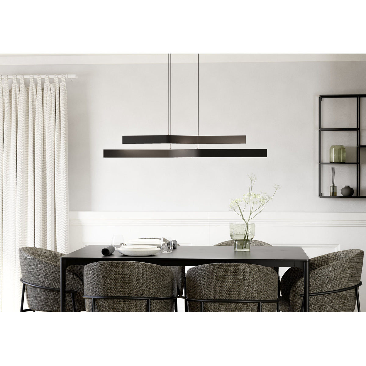 Playitas Pendant Light in brushed aluminium and black, two slim LED bars hung at staggered heights above a dining table in a neutral dining room setting.