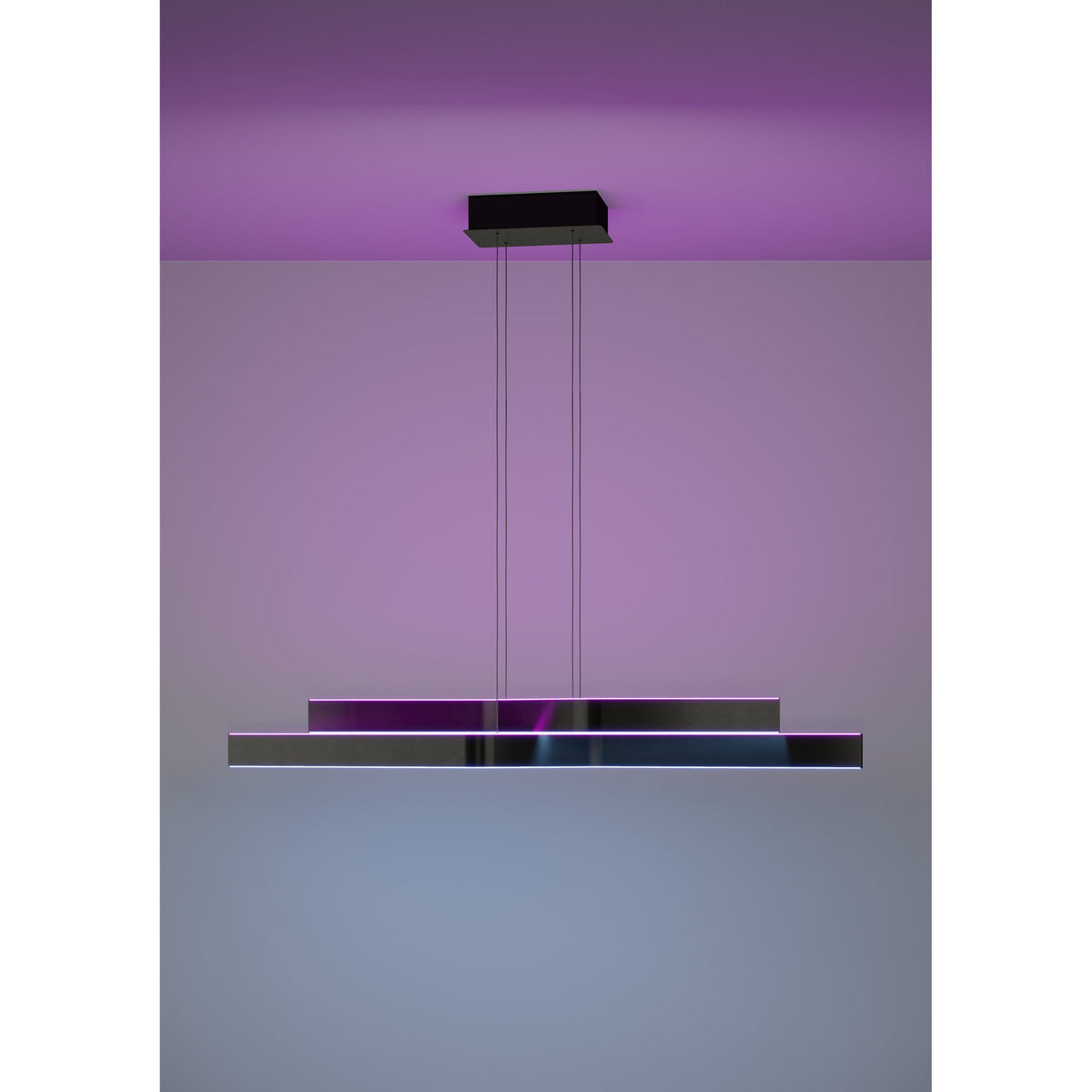 Playitas Pendant Light in brushed aluminium and black, two slim LED bars suspended on fine wires from a black ceiling canopy, shown glowing purple against a matching wall.