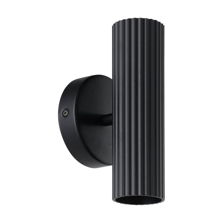 Portillo 2 Light Wall Light in black, featuring a fluted aluminium and steel cylinder on a round backplate for up and down lighting, shown on a plain white background.