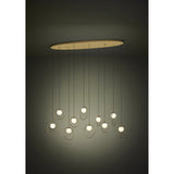 Portocolom Glass 10 Light Linear Pendant Light in brass and gold, with opal glass globes in slim gold rings hanging at varied heights from a long oval canopy.