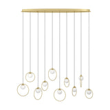 Portocolom 10-light linear pendant with a long oval brass and gold canopy, black cords, and opal glass globes each framed in slim gold rings, on a white background.