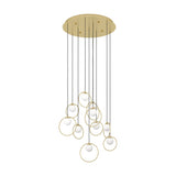 Portocolom 10-light cluster pendant with round brass ceiling plate, black cords, and slim gold rings holding opal glass globes at staggered heights, shown on a plain white background.