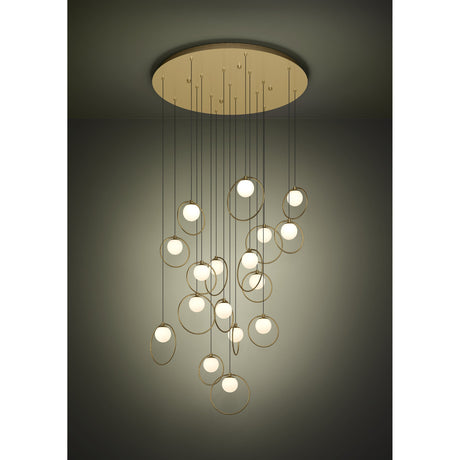 Portocolom Glass 17 Light Pendant in brass and gold, with opal glass globes in slim gold rings suspended at varied heights from a round brass canopy, shown against a dark neutral background.