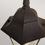 Here is a description using the provided product data: 

Close-up of the Parish 1 Light Outdoor Down Wall Light in a black powder-coated finish, showcasing its hexagonal design. This lantern, made from die-cast aluminum, includes glass panels and a small decorative finial on top, displayed against a plain gray background.