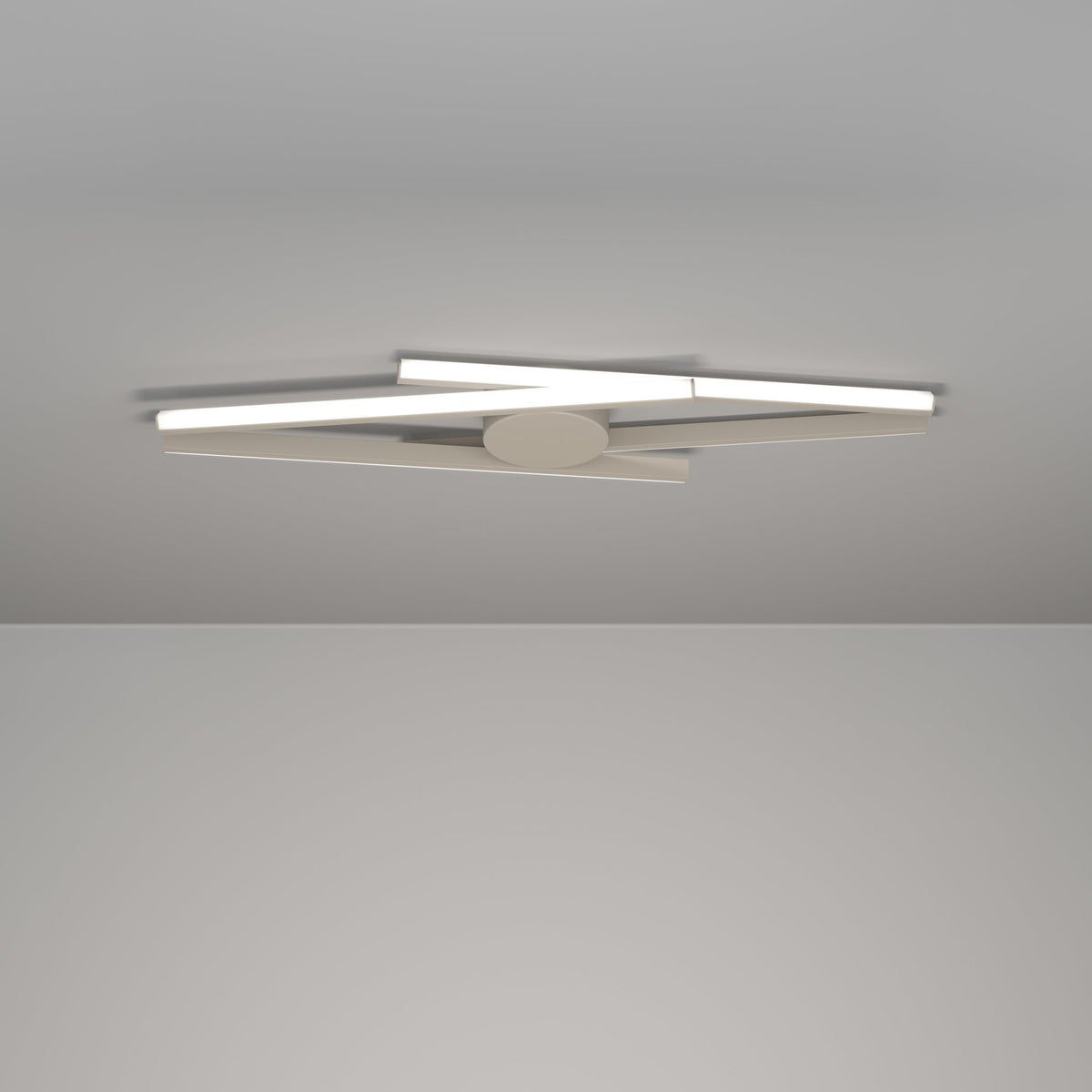Pradilla LED Flush Ceiling Light in sand, with four slim crossing bars and white diffusers around a round canopy, mounted close to a plain grey ceiling.