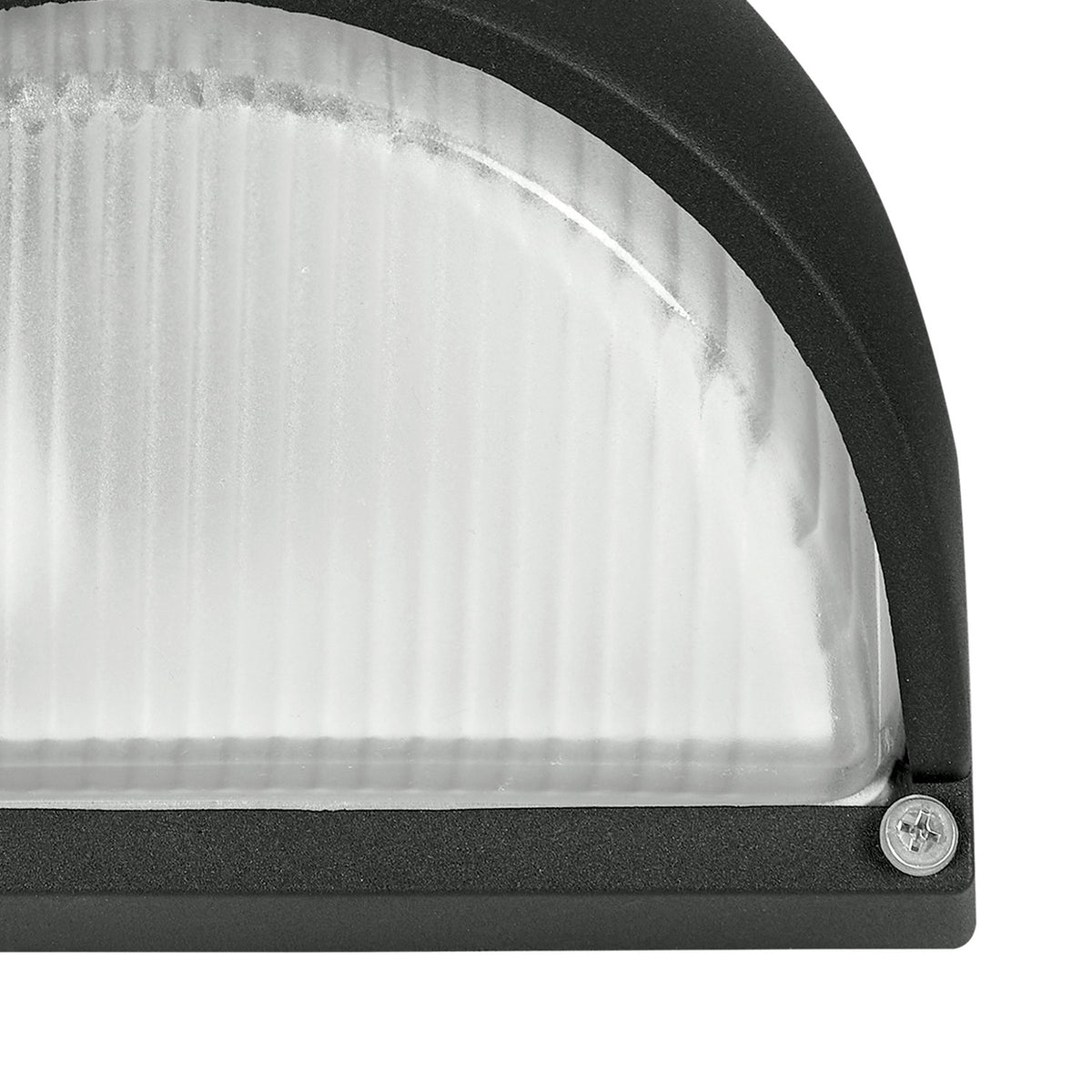 Close-up of the Prinorne outdoor wall light's black cast aluminium frame and ribbed glass shade, showing the curved hood edge and a visible fixing screw.