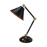 The Provence Element 1 Light Mini Table Lamp in black and polished brass features a cone-shaped shade with articulated arms, presenting a sleek design inspired by French aesthetics, set against a plain white background.