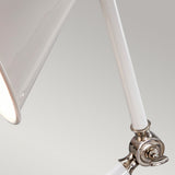 Close-up of the Provence Element 1 Light Mini Table Lamp in White and Polished Nickel against a gray background. The lamp's arm is angled to highlight its adjustable design, capturing the essence of Provence elegance with its glossy shade and polished joints.