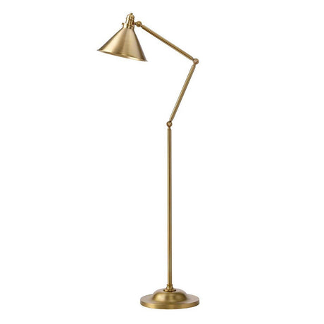 The Provence 1 Light Floor Lamp in aged brass, featuring a cone-shaped shade and adjustable knuckle joints for directional lighting, exudes vintage sophistication as it stands sturdily on a round base.