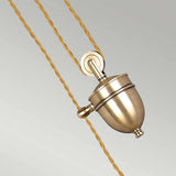 Close-up of the Provence 1 Light Rise & Fall Pendant in aged brass, featuring a vintage-style pulley mechanism with a twisted rope. The classic design shines with a metallic finish against a neutral background, evoking the timeless elegance of vintage-inspired lighting.