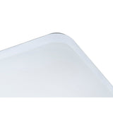 Close-up corner detail of the Mantra Quatro II 60W LED flush ceiling light in matt white with acrylic diffuser and chamfered edge, on a white background.