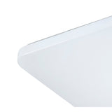 Close-up of the corner of Mantra Quatro II 60W LED flush ceiling light showing the matt white acrylic diffuser and chamfered edge profile.