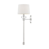 Introducing the Barbour 1 Light Wall Light in Polished Nickel, featuring a brushed metal finish and a white fabric lampshade. This fixture is designed with a cylindrical arm and round base, which adds modern elegance to any decor while delivering sleek sophistication against a plain background. Ideal for creating ambient lighting in any room.