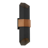 The Chasm Outdoor LED Large Wall Lantern in Matte Black showcases a modern design with integrated LED technology, featuring two elongated hexagonal shades and a central copper accent. Its geometric shape allows light to emit from both ends, making it ideal for contemporary interiors.