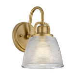 The Dublin 1 Light Wall Light in natural brass, featuring a frosted glass shade, comes with a curved arm and round base. This sophisticated wall fixture gently diffuses light, making it an ideal choice for achieving a warm ambiance in bathroom settings.