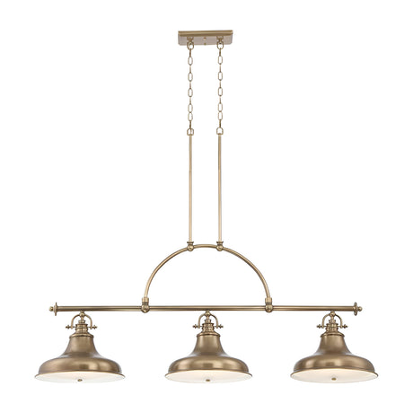 The Emery 3 Light Island Pendant - Weathered Brass is a vintage-inspired lighting fixture featuring three dome-shaped lampshades. It is suspended by two chains attached to a rectangular ceiling mount and showcases a curved arch design above the lights.