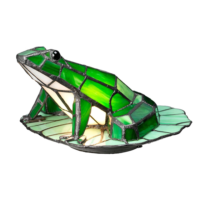 The Tiffany Animal Lamps Frog Lamp - Vintage Bronze is a delightful piece, showcasing a frog meticulously crafted from vibrant green and white stained glass. Resting on a green lily pad, it features black detailing for the eyes and outline, while casting a warm glow from within.