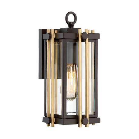 The Goldenrod Outdoor 1 Light Small Wall Lantern in a bronze finish showcases bevelled glass panels that elegantly highlight an exposed light bulb. Its design includes vertical gold accents and a top ring for hanging, seamlessly combining style and functionality.
