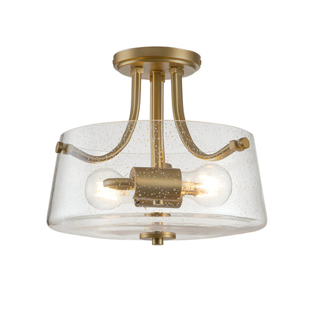 The Hollister 2 Light Semi-Flush - Brushed Brass features a clear glass shade with two visible bulbs, complemented by graceful curved metal supports for a contemporary and elegant design.