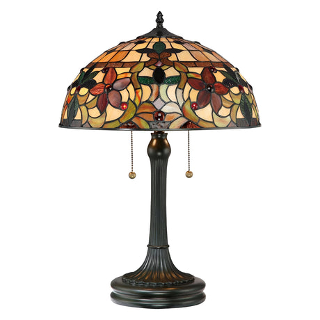 The Kami 2 Light Tiffany Table Lamp in Vintage Bronze showcases a classic charm with its ornate floral stained glass shade that features red and green colors, and it includes two pull chains for operation.