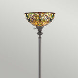 Showcasing a vibrant, handcrafted stained glass lampshade with floral patterns, the Kami 1 Light Tiffany Torchiere features a tall floor lamp design. Its base has a classic style in vintage bronze that brings timeless elegance to any room.