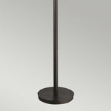 A Renaissance Copper Laguna 2 Light Floor Lamp stand without a lampshade, featuring a black, round base against a plain, light gray background.