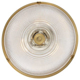 The Mantle 2 Light Semi-Flush in weathered brass showcases a round, textured design with a weathered brass rim complemented by concentric circular motifs. Its central circular structure, paired with prismatic glass components, imparts a retro, industrial aesthetic.