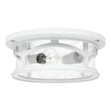 Introducing the Marblehead Outdoor 2 Light Flush - White, a modern ceiling light fixture characterized by its white, round design. It features a transparent glass cover with small air bubbles and is designed to be flush mounted. The metal frame houses two visible bulbs, creating a chic and contemporary look ideal for modern spaces.
