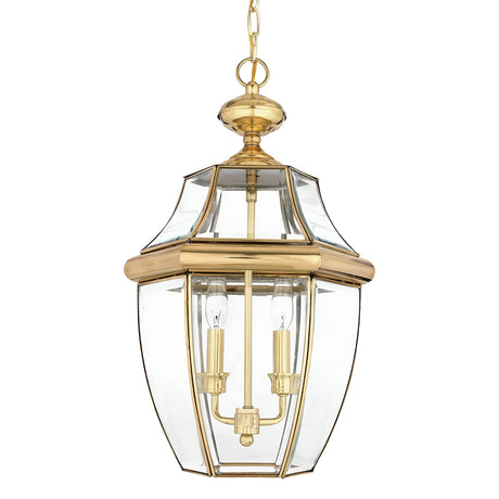 The Newbury Outdoor 2 Light Large Chain Pendant in lacquered polished brass hangs elegantly with a clear beveled glass enclosure, showcasing two candle-style bulbs inside. It is designed for ceiling mounting with a connecting chain.