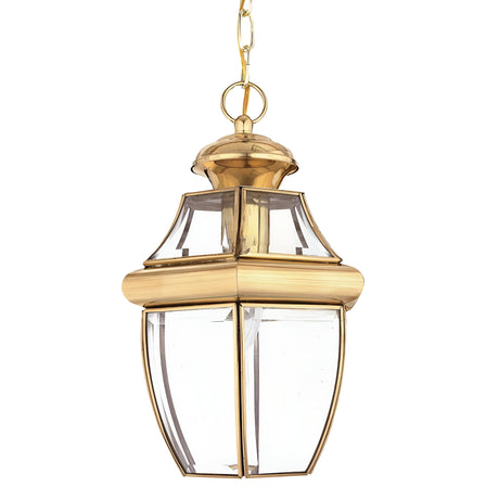 The Newbury Outdoor 1 Light Medium Chain Pendant in lacquered polished brass elegantly suspends with its lantern-style design, featuring clear beveled glass panels.