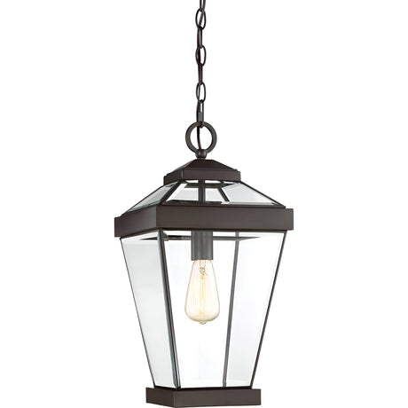 The Ravine Outdoor Large Chain Pendant in Western Bronze features a black, metal frame with clear glass panels suspended from a chain. Its visible bulb shines brightly, complementing the classic lantern design, which adds charm to both indoor and outdoor spaces.