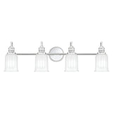 The Swell 4 Light Wall Light in polished chrome features a minimalist design with four frosted glass shades mounted on a horizontal bar attached to a circular base, adding contemporary flair to any modern home decor.