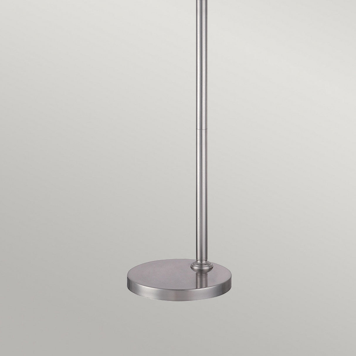 A modern Thompson LED Floor Lamp featuring a sleek brushed nickel pole and round base, ideal for task lighting, set against a plain white background.