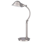 Introducing the Thompson LED Table Lamp in brushed nickel, boasting a sleek and modern design. It comes with an adjustable arm and head, highlighted by a dome-shaped shade on a round base. This minimalist piece is ideal for office or study areas.