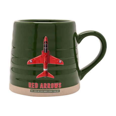 Green ribbed stoneware mug with a red jet aircraft design and "Red Arrows" text in red capitals, beige unglazed base, on a plain white background.
