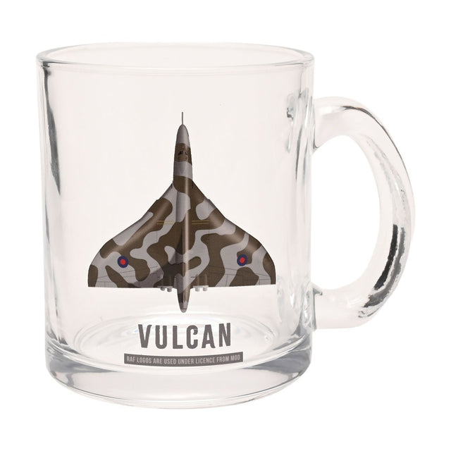 Clear glass mug with a printed top-down Vulcan delta wing aircraft in brown and grey camouflage, wing roundels, and "VULCAN" text, shown on a white background.