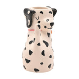 Spotted Dog Resin Matchstick Holder in white with black spots, featuring floppy ears, closed eyes, a pink collar, and a top opening for matches, shown on a plain white background.